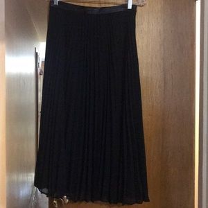 Black pleated skirt